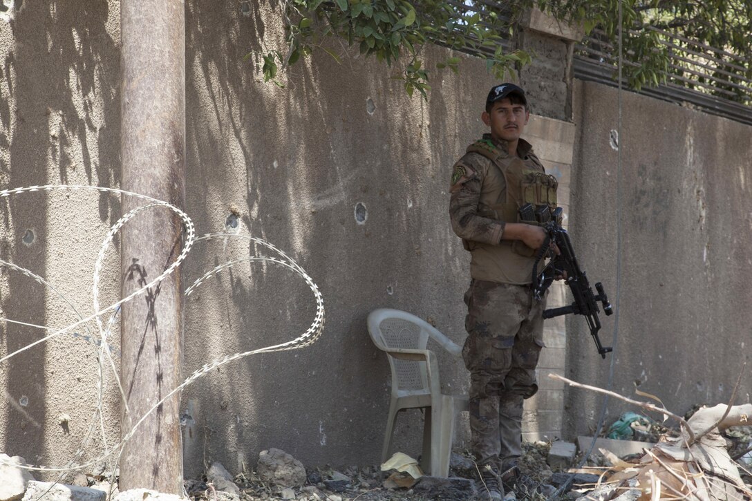 An Iraqi soldier guards a patrol base in Mosul, Iraq, June 19, 2017. Army photo by Cpl. Rachel Diehm