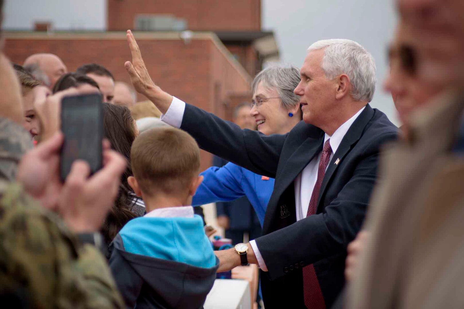 PETERSON AIR FORCE BASE, Colo. - Vice President Mike Pence alongside the Secretary of the Air Force Heather Wilson greet service members and families at Peterson Air Force Base, Colo., June 23, 2017. As vice president, this
was Pence's first official visit to Colorado Springs, Colo. (U.S. Air Force photo by Senior Airman Dennis Hoffman)

 
