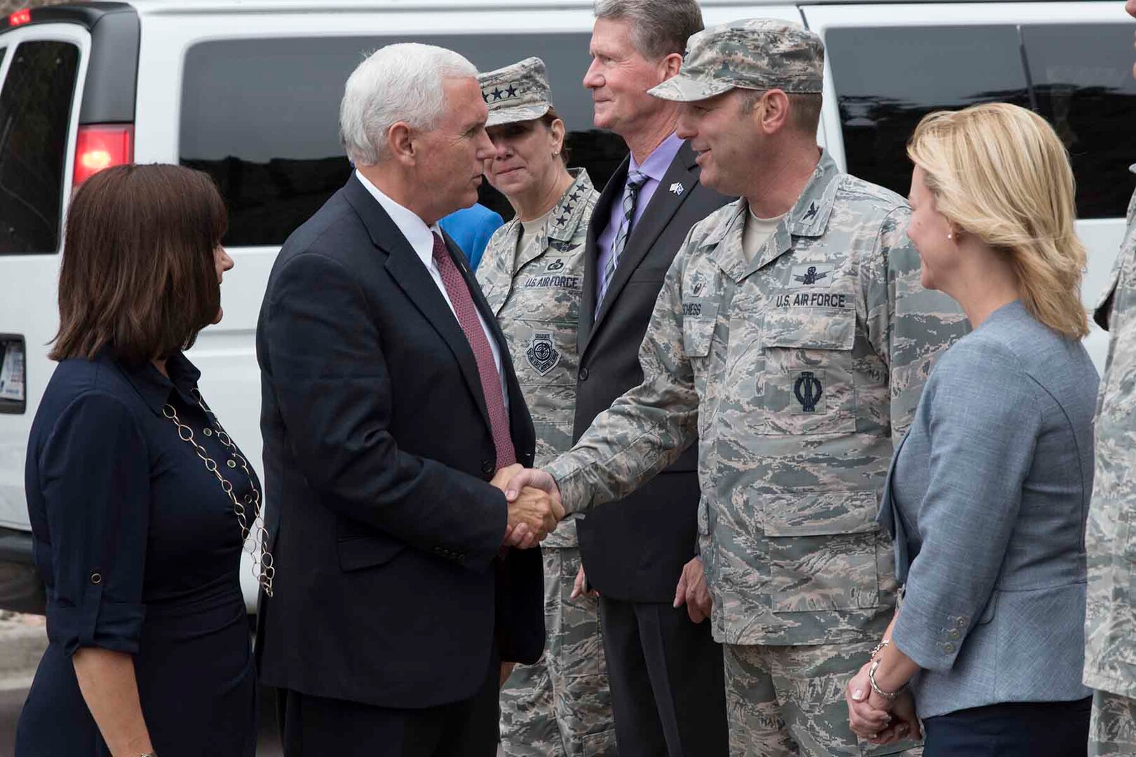 CHEYENNE MOUNTAIN AIR FORCE STATION, Colo. - Vice President Mike Pence with his wife, Karen, greet Col. Doug Schiess, 21st Space Wing commander, during
his visit to Cheyenne Mountain Air Force Station, Colo., June 23, 2017.  It has been 34 years since the last visit by the vice president of the United States. (U.S. Air Force photo by Senior Airman Dennis Hoffman)
