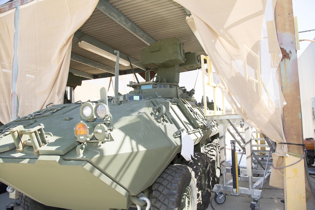 A Light Armored Vehicle Anti-Tank Modernization A2 model sits under an awning at Production Plant Barstow, Marine Depot Maintenance Command, aboard the Yermo Annex of Marine Corps Logistics Base Barstow, Calif., June 15. The turret atop the LAV-ATM is a Modified Target Acquisition System, MTAS, containing a state of the art rocket launcher designed to be more quickly deployed on target with fewer mechanical parts. The MTAS replaces the more than 30 year old Emerson 901 turret.