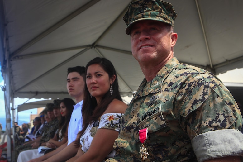 MARINE CORPS BASE HAWAII – Col. Sean C. Killeen listens to Maj. Gen. Joaquin F. Malavet, Commanding General, Marine Corps Instillations Pacific, speak during a change of command ceremony aboard Marine Corps Air Station Kaneohe Bay on June 23, 2017. During the Ceremony, Killeen also retired from the Corps after 34 years of honorable service. (U.S. Marine Corps photo by Cpl. Alex Kouns/Released)