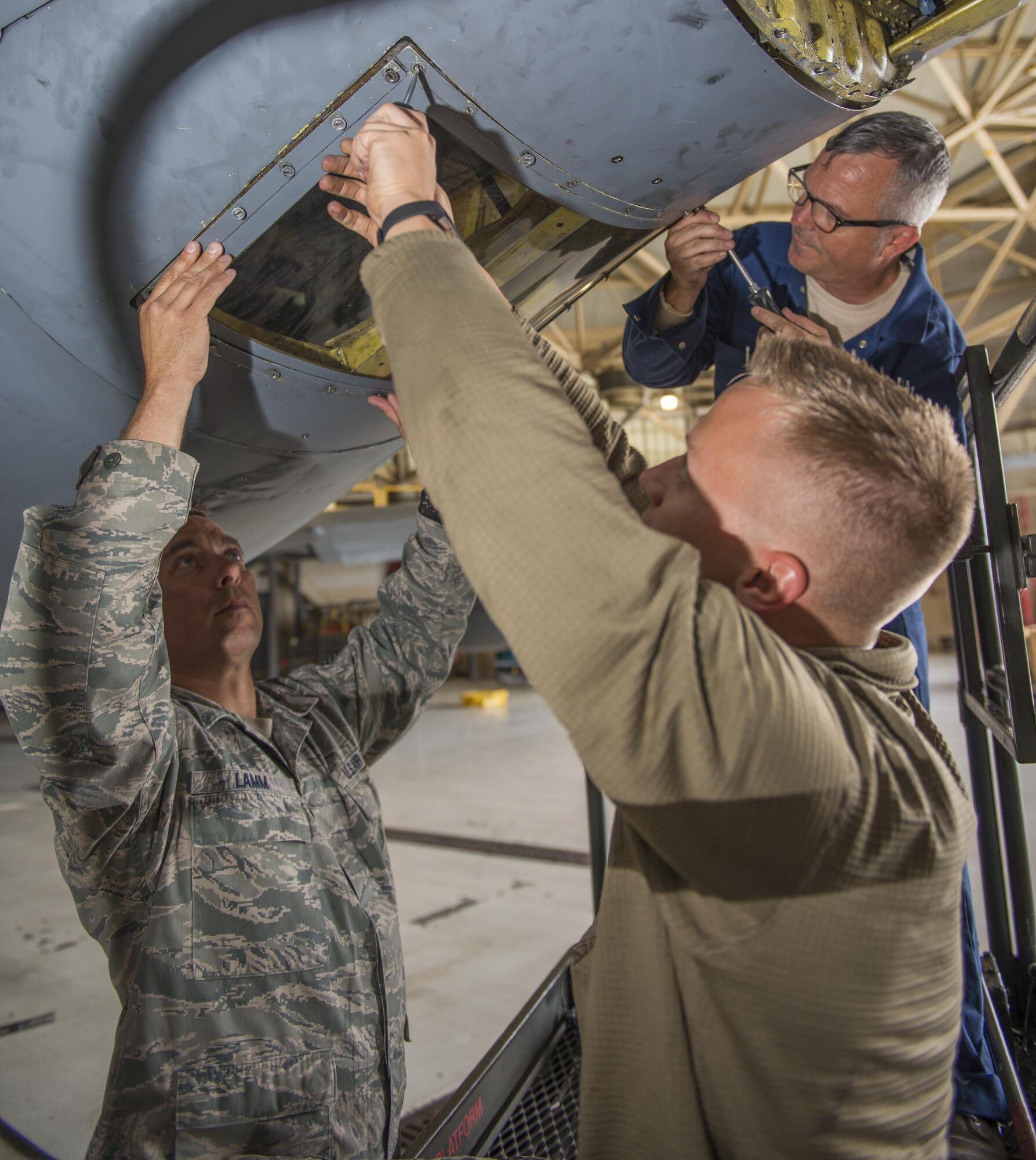Master Sgt. Steven Lamm, Senior Airman Brian Naughton and Master Sgt. Bill Ingwersen, 914th Aircraft Maintenance Squadron, install a boom window on a KC-135 Stratotanker, June 27, 2017, Niagara Falls Air Reserve Station, N.Y. The 914th officially made the transition from an Airlift Wing, flying and maintaining the C-130 Hercules, to an Air Refueling Wing, flying the KC-135, at the beginning of June. Aircraft Maintenance personnel have since been training to familiarize themselves with the new aircraft. (U.S. Air Force photo by Tech. Sgt. Stephanie Sawyer) 