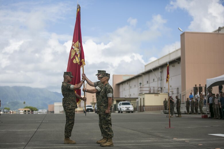 MARINE CORPS BASE HAWAII – Col. Sean C. Killeen relinquishes command of Marine Corps Base Hawaii to Col. Raul Lianez during a change of command ceremony aboard Marine Corps Air Station Kaneohe Bay on June 23, 2017. During the ceremony, Killeen also retired from the Corps after 34 years of honorable service. (U.S. Marine Corps photo by Sgt. Brittney Vella/Released)