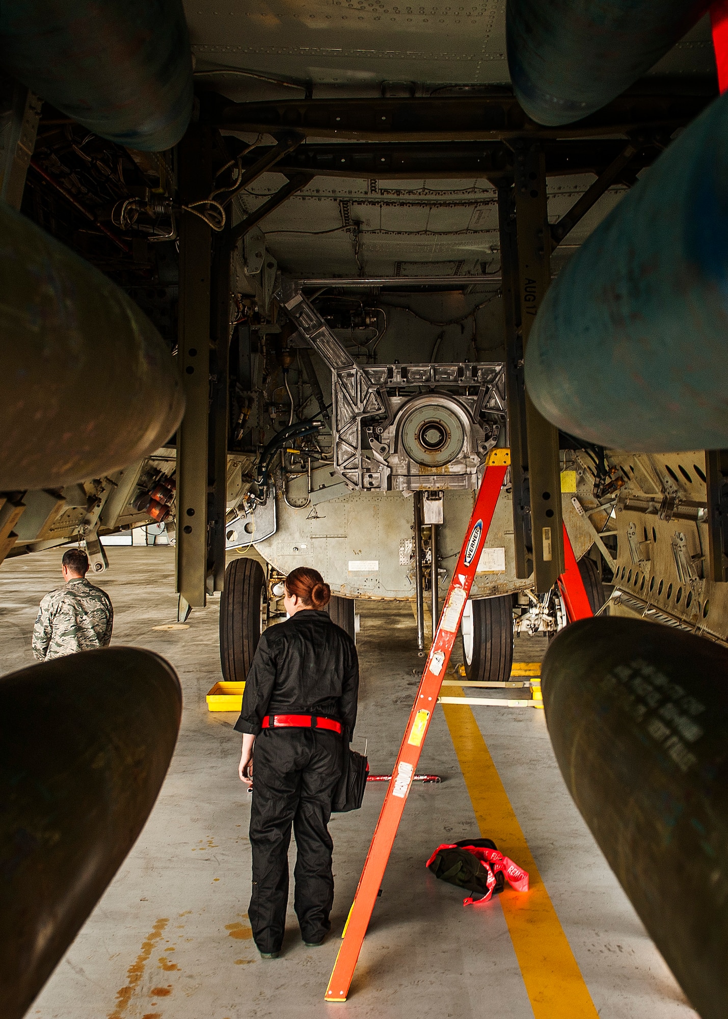 Staff Sgt. Amanda Cannon, 5th Aircraft Maintenance Squadron team chief, stands beneath a B-52H Stratofortress during a Global Strike Challenge competition at Minot Air Force Base, N.D., June 19, 2017. Cannon was responsible for leading the four-member team during the bomb-loading competition. (U.S. Air Force photo/Senior Airman J.T. Armstrong)