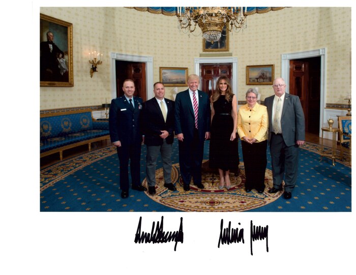 From the left, Chaplain (Capt.) Jeremy Caskey, Joshua Caskey, President Donald J. Trump, First Lady Melania Trump, Debra Caskey and Gerald Caskey pose for a photo in the White House, June 5. The Caskeys attended a Gold Star family reception with about 40 other families who have lost loved ones during wartime. (White House photo)