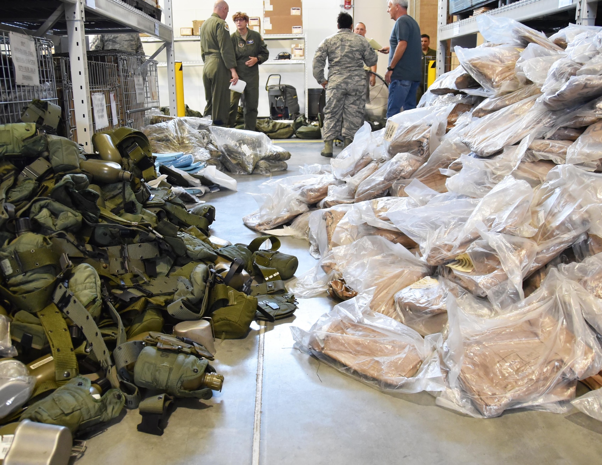 McConnell Airmen help sort deployment equipment following a redeployment of 21 members of the 931st Air Refueling Wing, June 26, 2017, at McConnell Air Force Base, Kan. The Airmen deployed to Turkey as part of ongoing U.S. operations overseas. (U.S. Air Force photo by Tech. Sgt. Abigail Klein)