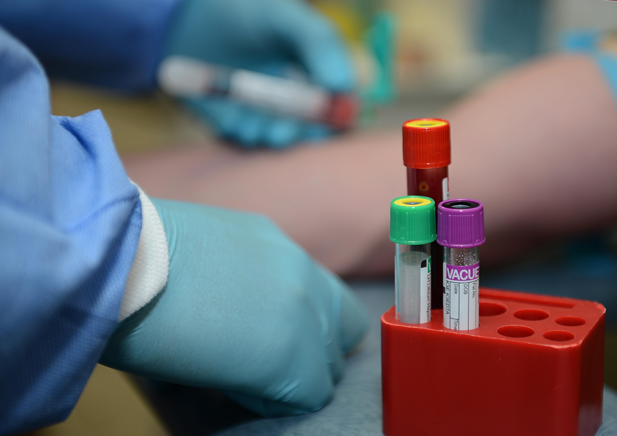 U.S. Army Spc. Juan Hernandez, Jr., McDonald Army Medical Center U.S. Army Medical Activity medical laboratory technician, draws a blood sample from a patient at Joint Base Langley-Eustis, Va., June 26, 2017. The JBLE lab technicians perform over a million tests annually and study the hematology, coagulation, chemistry and microbiology of the samples. (U.S. Air Force photo/Staff Sgt. Teresa J. Cleveland)