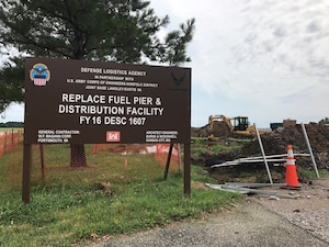 A sign for the new fuel service station stands as construction takes place at Joint Base Langley-Eustis, Va., June 20, 2017. The service station will provide gasoline and E-85 diesel fuels for government vehicles, generators and flight equipment. (U.S. Air Force photo/Staff Sgt. J.D. Strong II)   