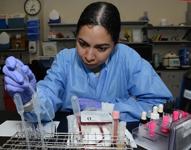 U.S. Air Force Staff Sgt. Mari Crespo, 633rd Medical Support Squadron Laboratory medical laboratory technician, conducts tests on a blood bank unit at Joint Base Langley-Eustis, Va., June 26, 2017. Blood units are used for transfusions in emergency situations and surgical procedures. (U.S. Air Force photo/Staff Sgt. Teresa J. Cleveland)