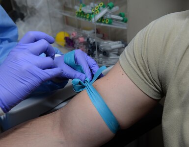 U.S. Air Force Senior Airman Ariel Pestanas, 633rd Medical Support Squadron Laboratory medical laboratory technician, prepares to draw blood from a patient at Joint Base Langley-Eustis, Va., June 26, 2017. Patient verification and attention to detail are crucial for technicians, to ensure medical professionals receive accurate information so they can provide the necessary medical treatment to patients. (U.S. Air Force photo/Staff Sgt. Teresa J. Cleveland)