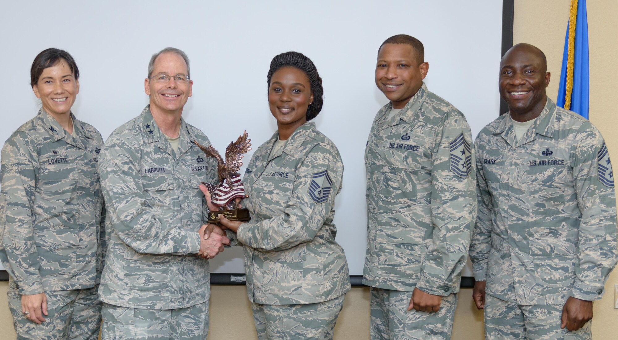 Maj. Gen. Bob LaBrutta, 2nd Air Force commander, 81st Training Wing leadership present the 2nd AF Outstanding Senior NCO of the Year award to Senior Master Sgt. Tiffany Patterson, 81st Force Support Squadron career assistance advisor, at the Professional Development Center June 20, 2017, on Keesler Air Force Base, Miss. The 2nd AF mission is to train, develop and inspire the world’s premier Airmen to power the world’s greatest Air Force. (U.S. Air Force photo by André Askew)

