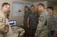 U.S. Air Force Master Sgt. Marc Richard, the Detachment 1, 66th Training Squadron, superintendent, teaches Warrant Officer Katsumi Yamazaki the Japan Air Self Defense Force senior enlisted advisor, about cold weather shelters, June 23, 2017, at Eielson Air Force Base, Alaska. During the visit, Richard talked about the different things needed to survive in a cold environment. (U.S. Air Force photo by Airman 1st Class Isaac Johnson)