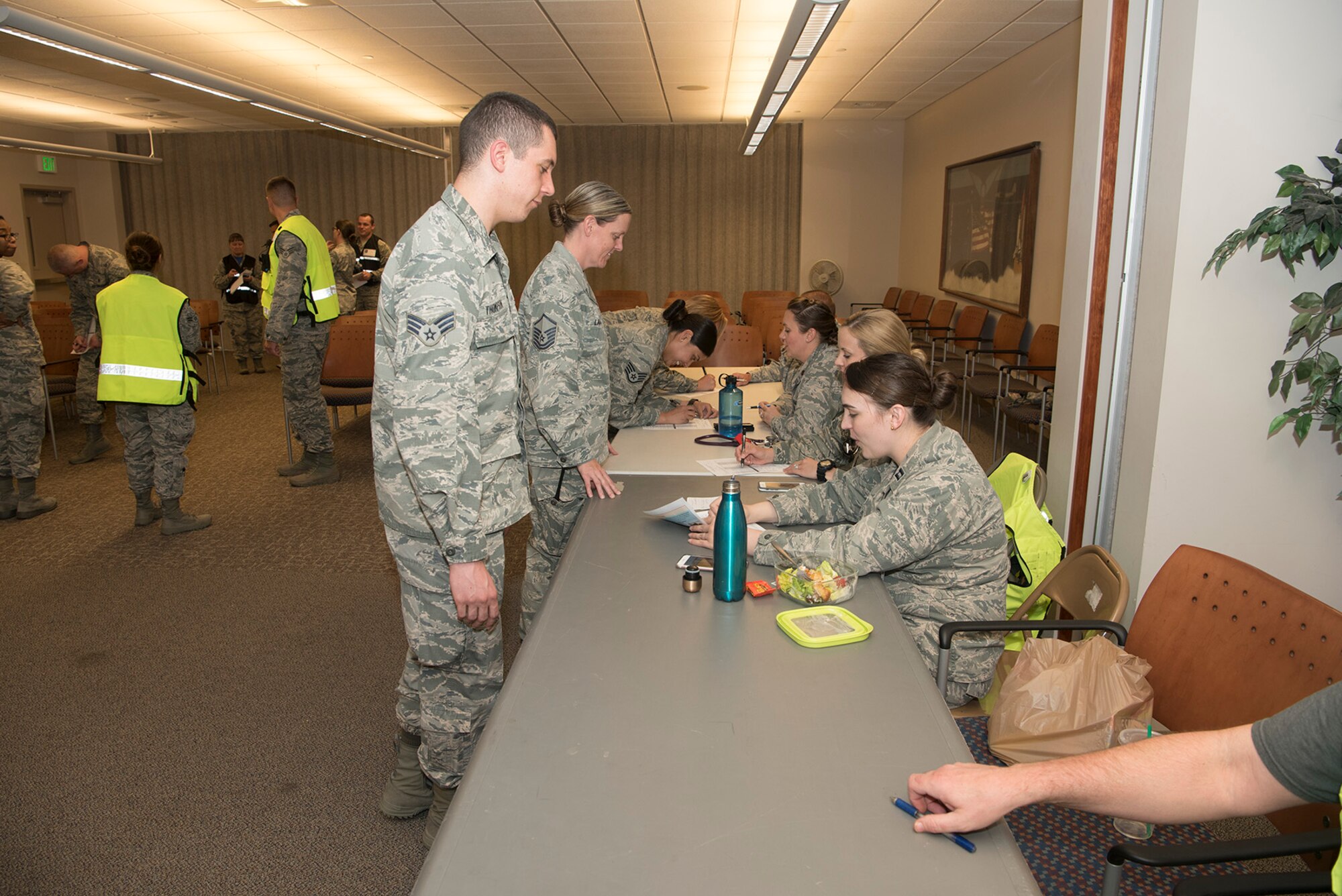 Members of Team Pete participate in the 2017 public health emergency dispensing exercise at Peterson Air Force Base, Colo., June 16,2017. The exercise was designed to test the response time of first responders in the event of an endemic viral outbreak.  (U.S. Air Force photo by Steve Kotecki)