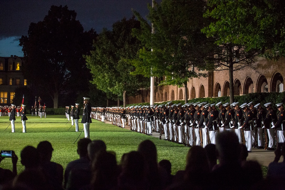 Marching companies with Marine Barracks Washington D.C. perform “fix bayonets” during a Friday Evening Parade at the Barracks, June 23, 2017. The guest of honor for the parade was Lt. Gen. Thomas Trask, vice commander, United States Special Operations Command, and the hosting official was Lt. Gen. James Laster, director, Marine Corps Staff. (Official Marine Corps photo by Cpl. Robert Knapp/Released)
