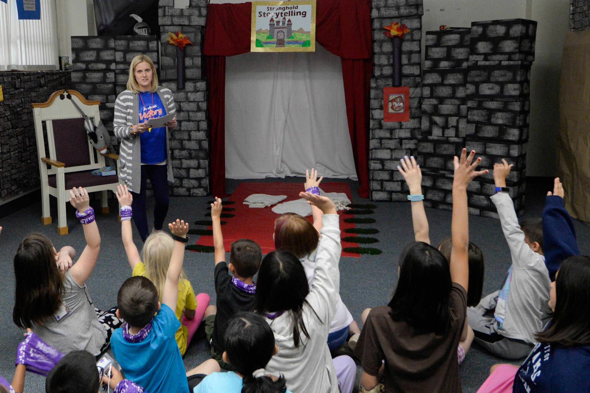 Children participate in story telling during Yokota’s annual Vacation Bible School at Yokota Air Base, Japan, June 23, 2017. Approximately 150 children attended the VBS where they participated in various activities such as arts and crafts, storytelling and snack time. The chapel was decorated to represent a medieval castle for the theme of ‘Mighty Fortress’.