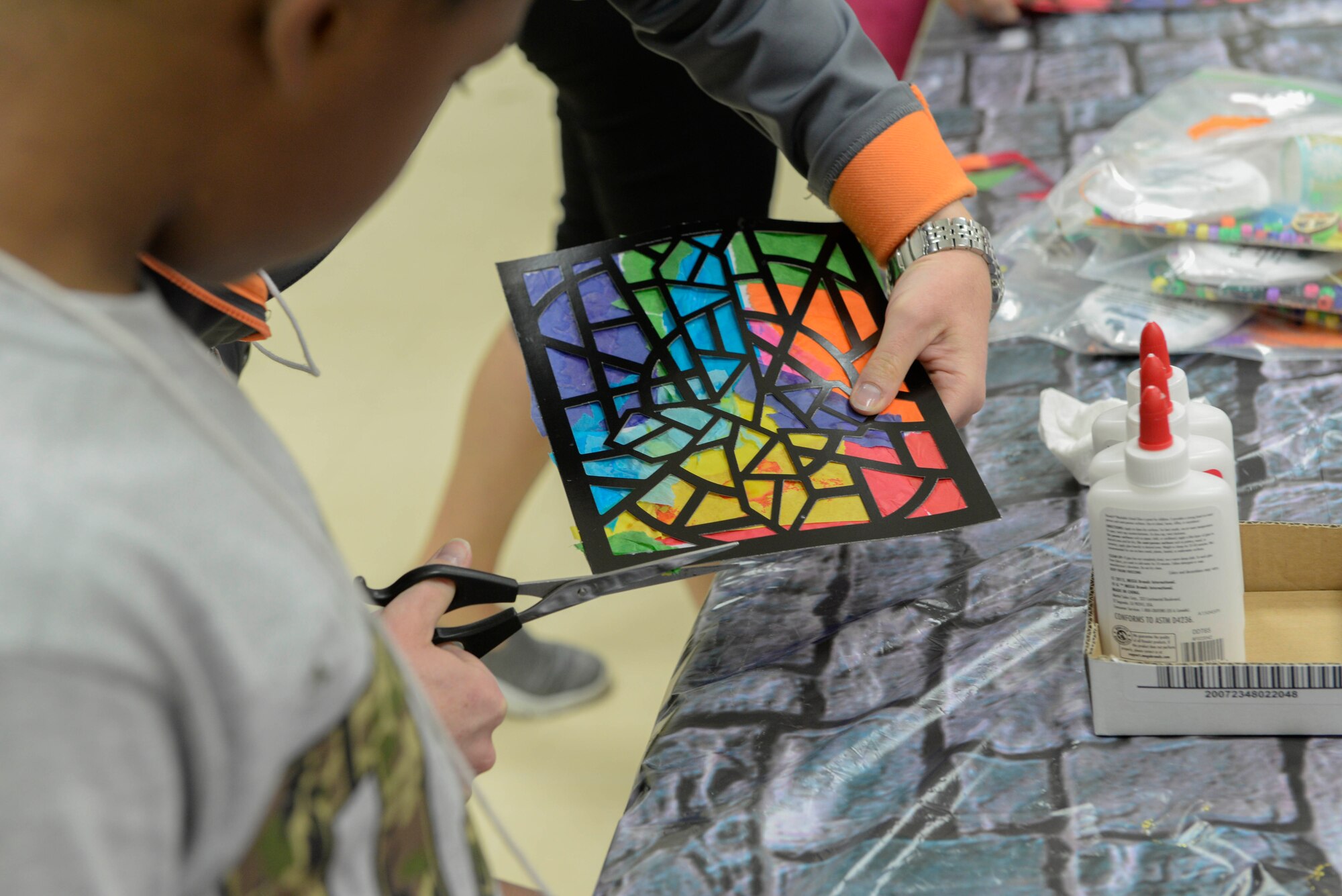 Participants of Yokota’s annual Vacation Bible School create stained glass windows at Yokota Air Base, Japan, June 23, 2017. A different story from the Bible served as the theme for the activities each day. 