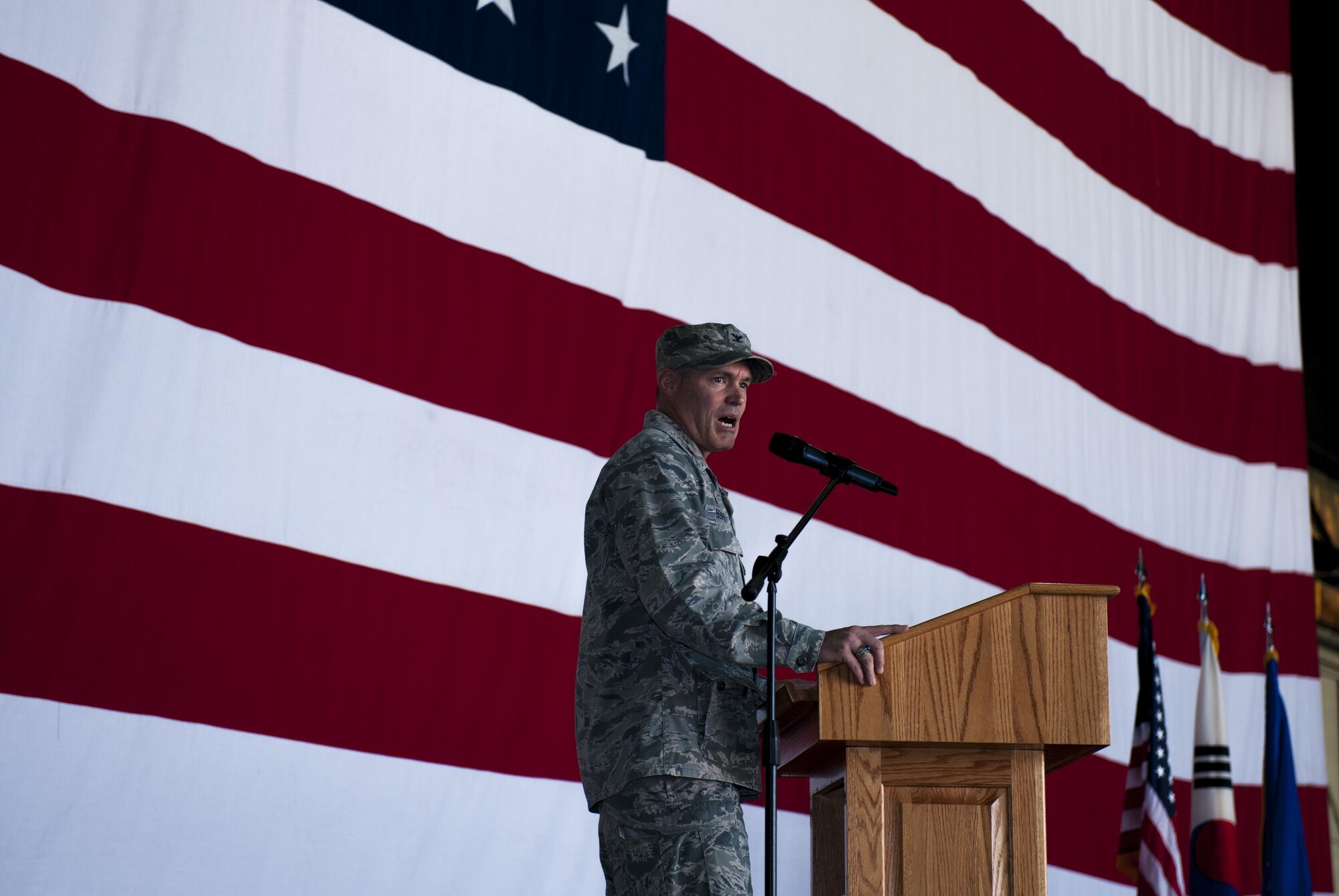 U.S. Air Force Col. George Sebren, 8th Maintenance Group commander, speaks to the 8th Fighter Wing June 28, 2017, during a change of command ceremony at Kunsan Air Base, Republic of Korea. Sebren took command of the 8th MXG from Col. James Long and, upon assuming the position, received the title of “Phoenix.” (U.S. Air Force photo by Senior Airman Colville McFee/Released)