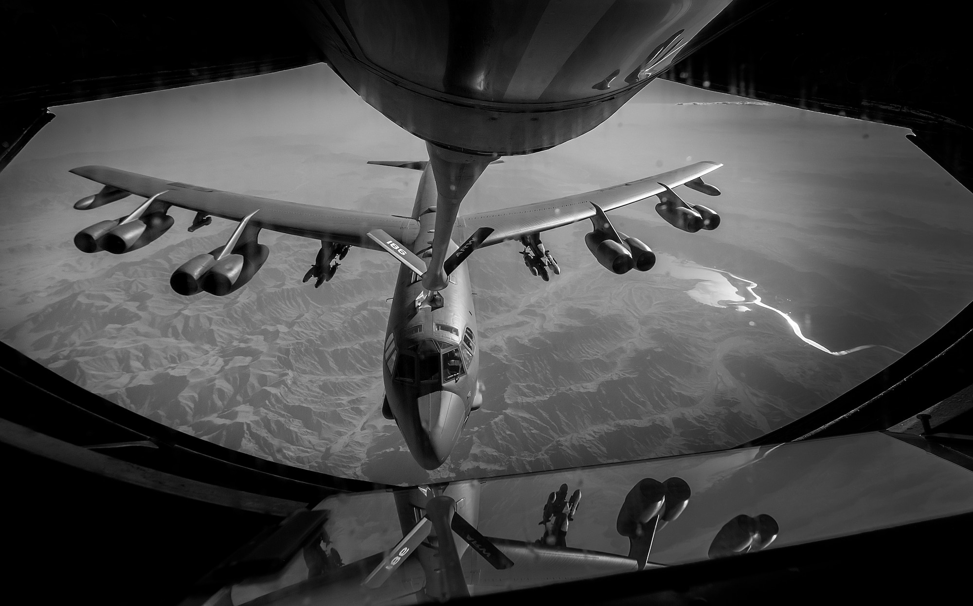 A U.S. Air Force B-52 Stratofortress receives fuel from a 340th Expeditionary Air Refueling Squadron KC-135 Stratotanker during a flight in support of Operation Resolute Support June 6, 2017. The 340th EARS, part of U.S. Air Forces Central Command, is responsible for delivering fuel for U.S. and coalition forces, enabling a persistent 24/7 presence in the area of responsibility. (U.S. Air Force photo by Staff Sgt. Trevor T. McBride) 
