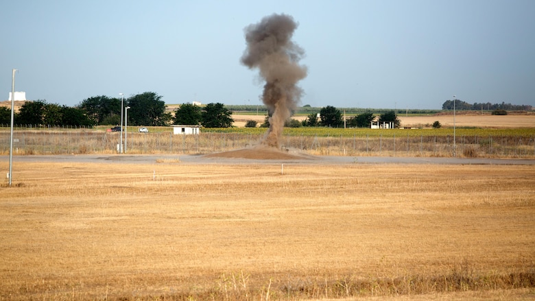 Dynamite explodes during live-fire demolition training between explosive ordnance disposal personnel of Special Purpose Marine Air-Ground Task Force-Crisis Response-Africa and Spanish Second Air Support Deployment Squadron (SEADA) at Morón Air Base, Spain, June 20, 2017. This was the first time, either jointly or separately, U.S. and Spanish EOD personnel conducted live, explosive ordnance training on the air base. (U. S. Marine Corps photo by Staff Sgt. Kenneth K. Trotter Jr./Released)