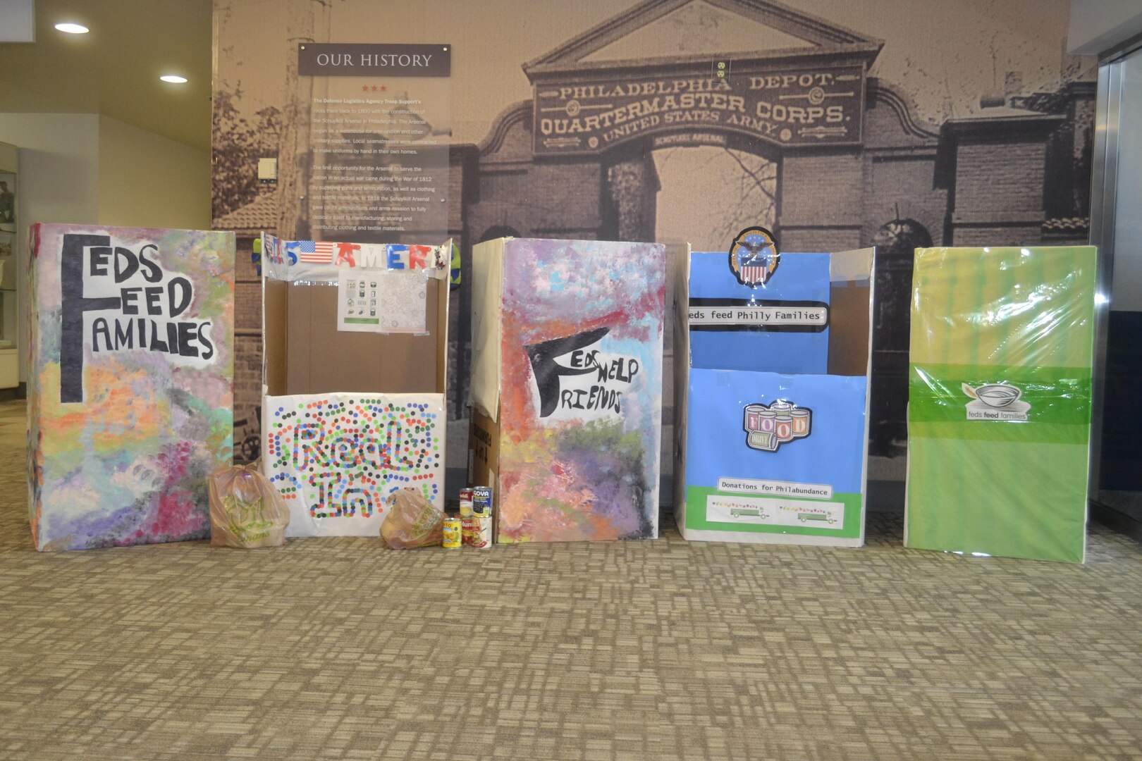 The local Feds Feed Families food drive opened June 20, and Defense Logistics Agency employees in Philadelphia have already donated 962 pounds of food. Several employees and their families volunteered to decorate the collection boxes. 