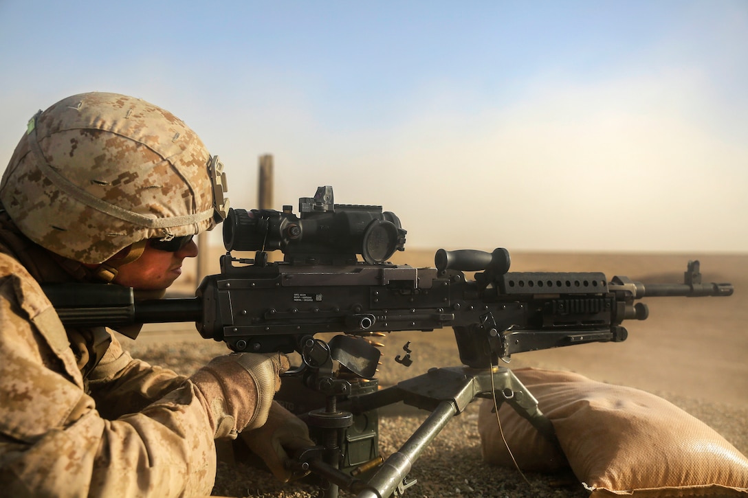 A Marine fires an M240L machine gun during a live-fire range at Camp Shorabak, Afghanistan, June 25, 2017. The Marine is assigned to Charlie Company, 1st Battalion, 2nd Marine Regiment and is attached to Task Force Southwest, which works to train, advise and assist the Afghan army and national police. Marine Corps photo by Sgt. Lucas Hopkins 