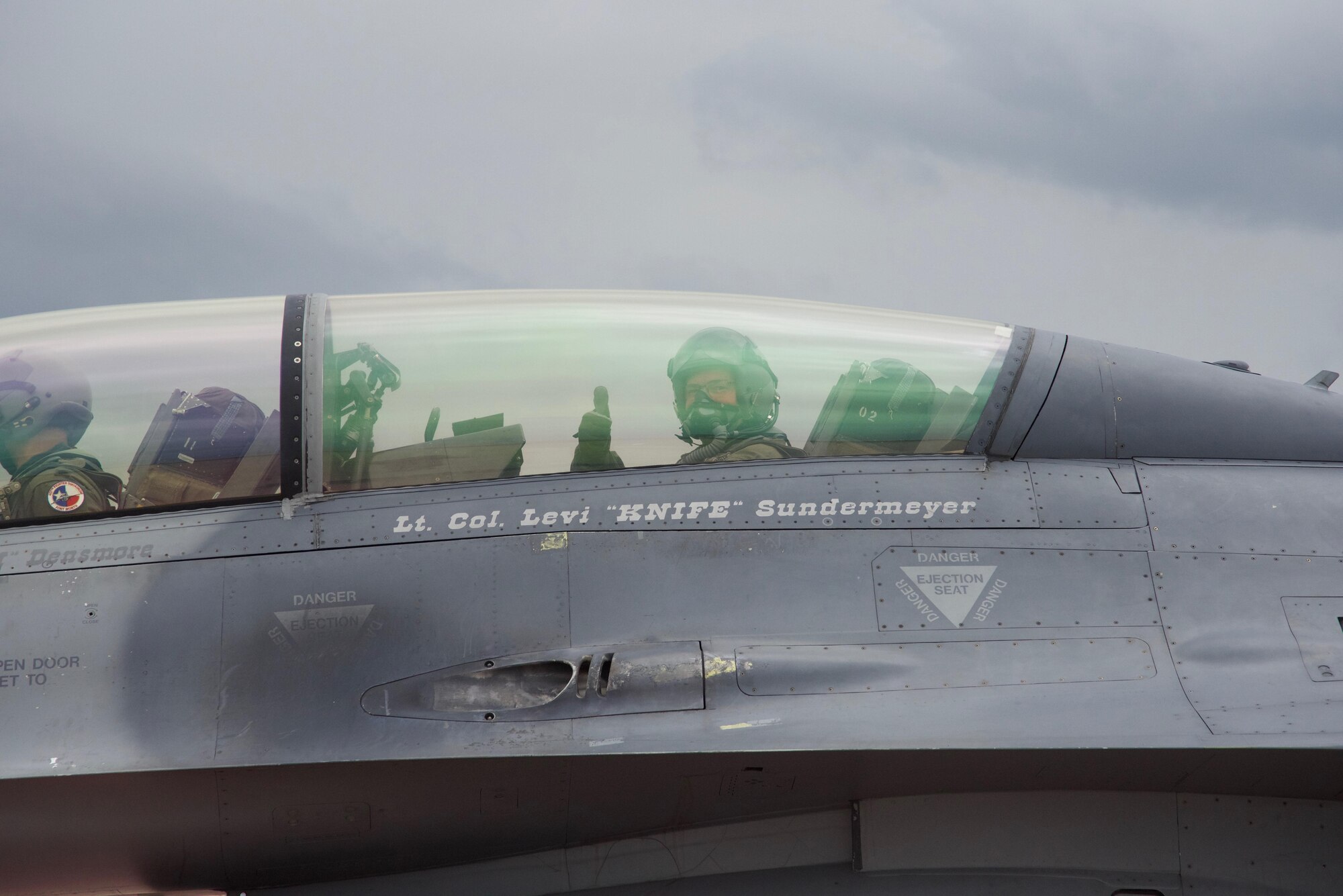 Lt. Col. David Edwards, 301st Maintenance Group deputy commander, gives a thumbs up May 19, 2017, before taking off in the backseat of an F-16 at Naval Air Station Fort Worth Joint Reserve Base, Texas. Edwards received an incentive flight for his work as deputy commander. (U.S. Air Force photo by Tech. Sgt. Jeremy Roman) 