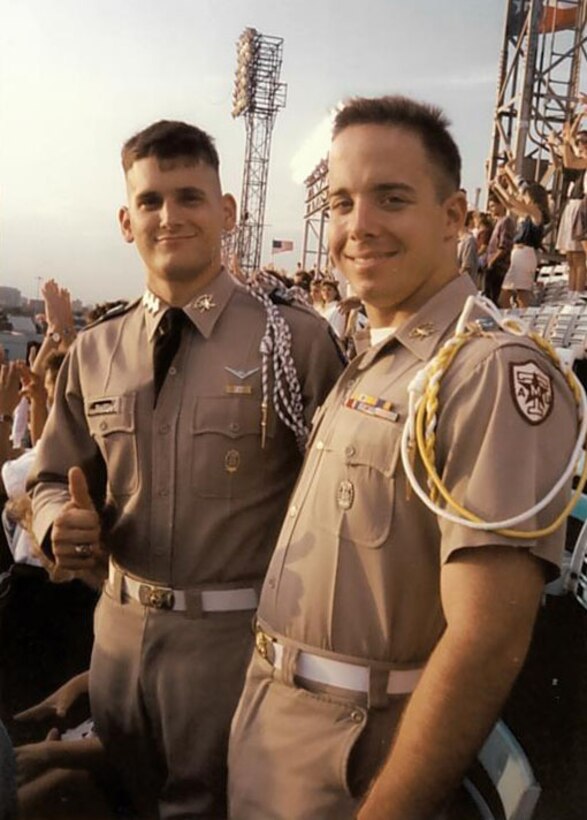 Texas A&M University cadets Douglas Thies, left, and David Vaclavik, stand for a picture in their uniforms at the Cotton Bowl Stadium in Dallas, Texas, circa 1992. The two cadets would eventually become U.S. Air Force colonels and take command of the 20th Operations Group and the 20th Mission Support Group, respectively, providing combat-ready F-16CM Fighting Falcon airpower and Airmen to suppress enemy air defenses and provide close air support in the U.S. Central Command’s area of responsibility. (Courtesy photo)