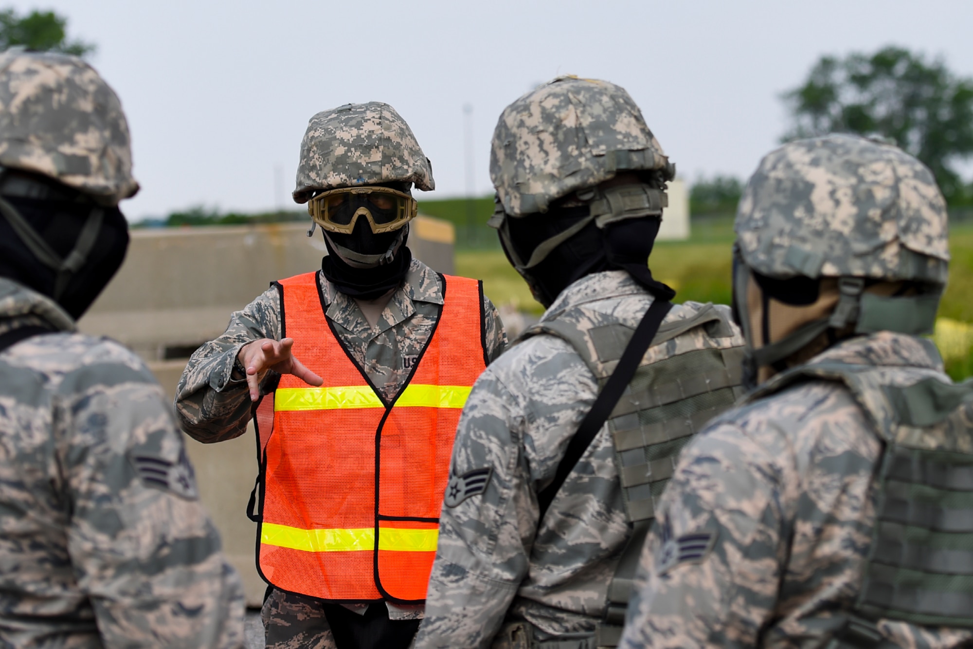 Master Sgt. Michael Rush, 434th Security Forces Squadron craftsman, provides a pre-training brief to his troops during a dynamic tactical training scenario, June 4 at Grissom Air Reserve Base, Ind. This training allows SFS members to improve readiness for real life tactical situations. (U.S. Air Force photo/Senior Airman Cali Wetli)