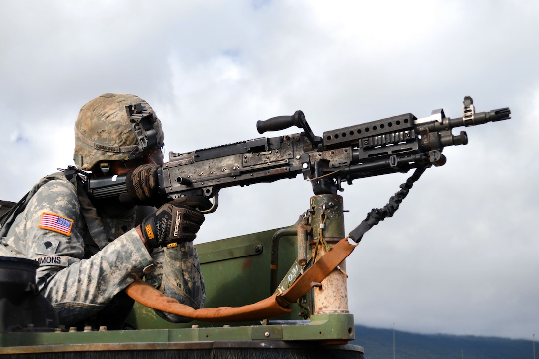 Army Spc. Taj Simmons mans a M240B machine gun turret atop a Humvee during an exercise at the Pohakuloa Training Area, Hawaii, June 24, 2017. Simmons is a wheeled vehicle mechanic assigned to the 25th Infantry Division’s 29th Brigade Engineer Battalion, 3rd Brigade Combat Team. Army photo by Staff Sgt. Armando R. Limon