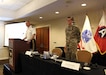 Maj. Gen. Terrence McKenrick, deputy commanding general, U.S. Army Central, introduces Gen. Joseph Votel, commander, U.S. Central Command, to the participants of the USARCENT CASA Land Forces Symposium in Alexandria, Va., June 19-22, 2017. The symposium gave senior leaders of USARCENT an opportunity to hear from civilian and military experts on the Middle East and Central and South Asia, such as Votel.