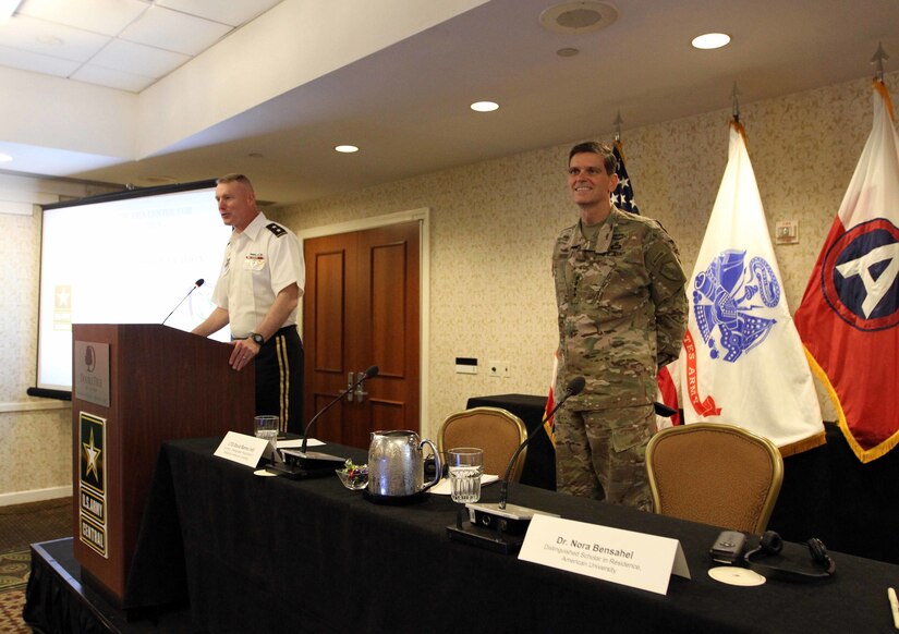 Maj. Gen. Terrence McKenrick, deputy commanding general, U.S. Army Central, introduces Gen. Joseph Votel, commander, U.S. Central Command, to the participants of the USARCENT CASA Land Forces Symposium in Alexandria, Va., June 19-22, 2017. The symposium gave senior leaders of USARCENT an opportunity to hear from civilian and military experts on the Middle East and Central and South Asia, such as Votel.