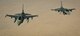 Two Belgian Air Force F-16A Fighting Falcons fly in formation after receiving fuel from a 340th Expeditionary Air Refueling Squadron KC-135 Stratotanker in support of Operation Inherent Resolve June 23, 2017. Belgian F-16s have been deployed in support of Operation Inherent Resolve since October 2014 and recently reached 8,000 flight hours in the coalition mission to destroy ISIS. (U.S. Air Force photo by Staff Sgt. Michael Battles)