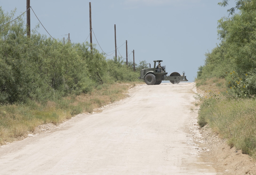 Soldiers with the 277th Engineer Company based in San Antonio repair a 2.5-mile stretch of dirt road in a colonia near Laredo, Texas, as part of an Innovative Readiness Training mission June 23, 2017. Nearly 200 Army Reserve Soldiers are participating in the mission along the Texas-Mexico border.