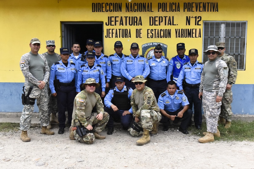 A team from Joint Security Forces and Honduran Police pose for a photo at La Paz, Honduras, June 20, 2017 after completing a Subject Matter Expert Exchange where they learned  techniques on how to tactically clear rooms to prevent casualties within their force. 