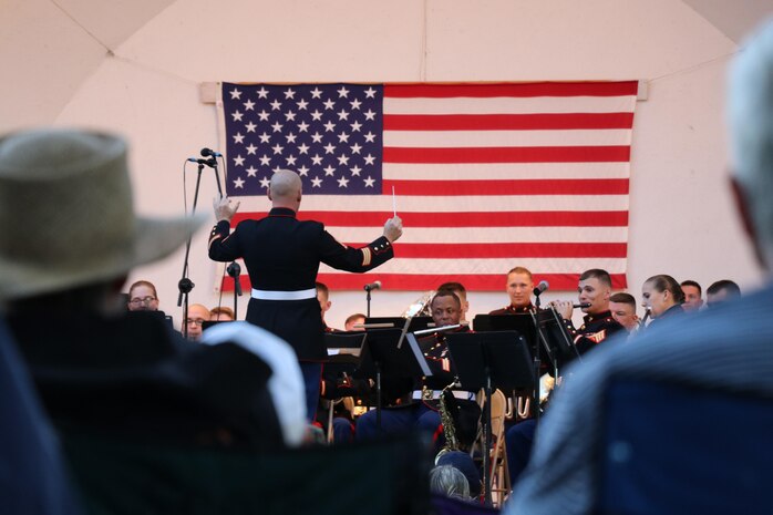 The 2nd Marine Division Band from Camp Lejeune, N.C., performs at Overman Park during the Sturgis Falls Celebration in Cedar Falls, Iowa, June 24, 2017. The band presence helps the recruiting efforts in the Midwest, including the Musician Enlisted Option Program. (U.S. Marine Corps photo by Sgt. Jennifer Webster/Released)