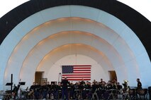 The 2nd Marine Division Band from Camp Lejeune, N.C., performs at Overman Park during the Sturgis Falls Celebration in Cedar Falls, Iowa, June 24, 2017. The band presence helps the recruiting efforts in the Midwest, including the Musician Enlisted Option Program. (U.S. Marine Corps photo by Sgt. Jennifer Webster/Released)