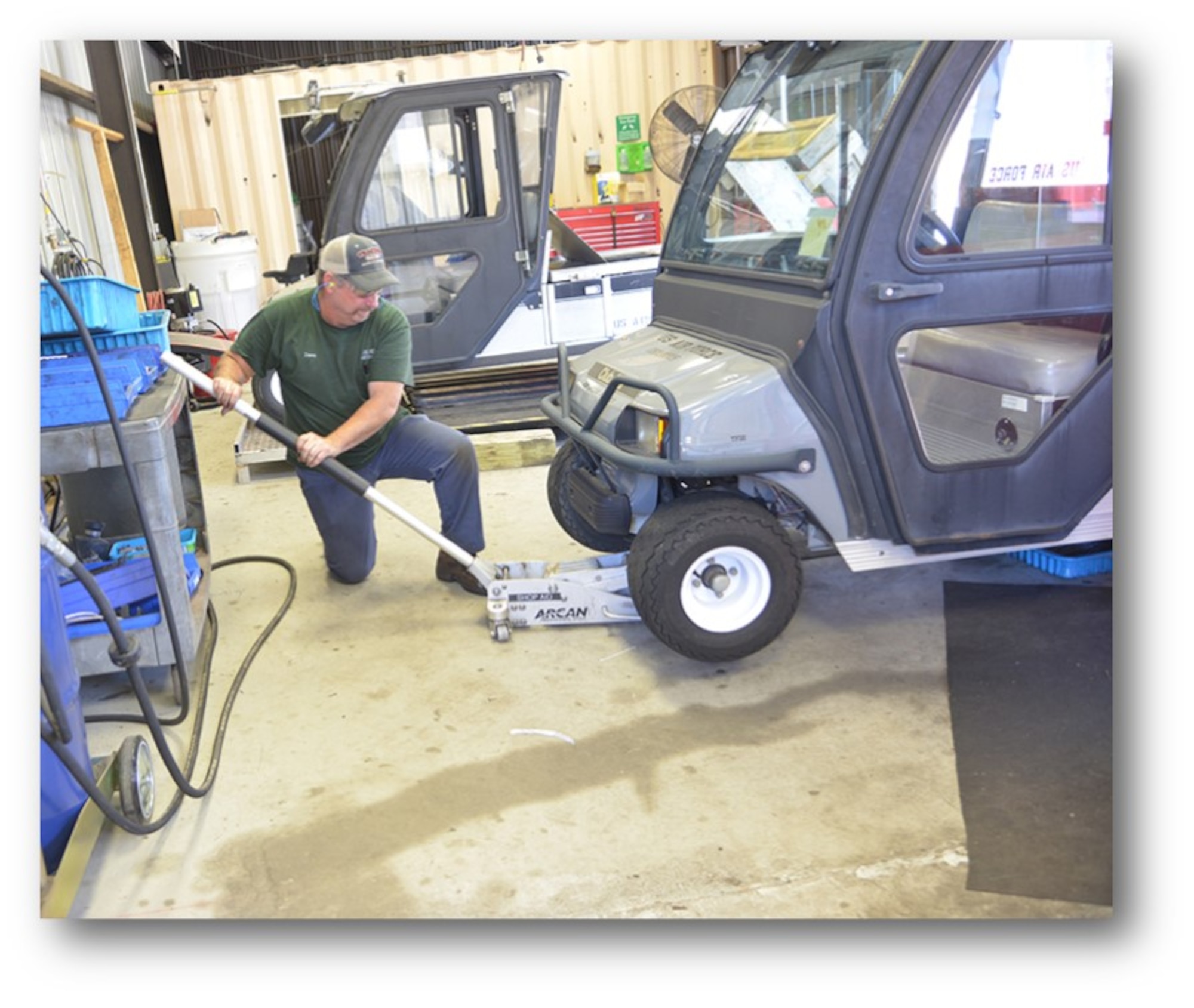 David Barrentine, 402nd Maintenance Support Squadron mechanic, jacks up a golf cart for to perform mainte-nance on its wheel and tire assembly. Complex golf cart sustainment was previously accomplished by con-tract until the 402nd Maintenance Support Group took over the workload in March 2016. In just one year, the crew had not just kept up with demand for the vehicles; it had vastly improved every facet of the operation. (U.S. Air Force photo/RAYMOND CRAYTON, JR.)