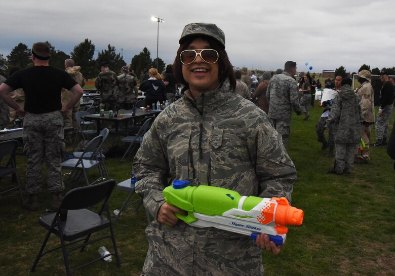 Staff Sgt. Jared Wiedmer, 50th Contracting Squadron, smiles for the camera during the 50th Space Wing’s combat dining out at Schriever Air Force Base, Colorado, Friday, June 23, 2017. Participants dressed in a variety of comical costumes and outfits- reflective of the casual atmosphere the event fostered. (U.S. Air Force photo/Airman 1st Class William Tracy)


