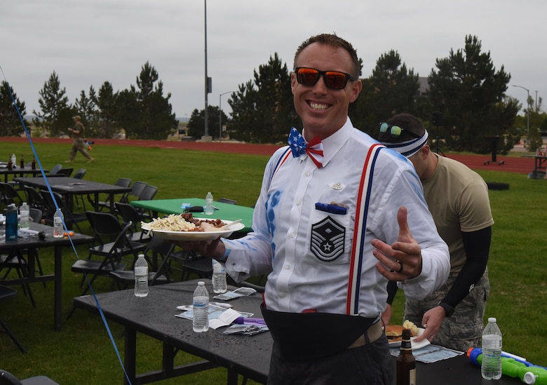 Master Sgt. Justin Halterman, 4th Space Operations Squadron, flaunts his “first shirt” outfit during the 50th Space Wing’s combat dining out at Schriever Air Force Base, Colorado, Friday, June 23, 2017. Airmen enjoyed food provided by “Bird Dog BBQ” during the event. (U.S. Air Force photo/Airman 1st Class William Tracy)