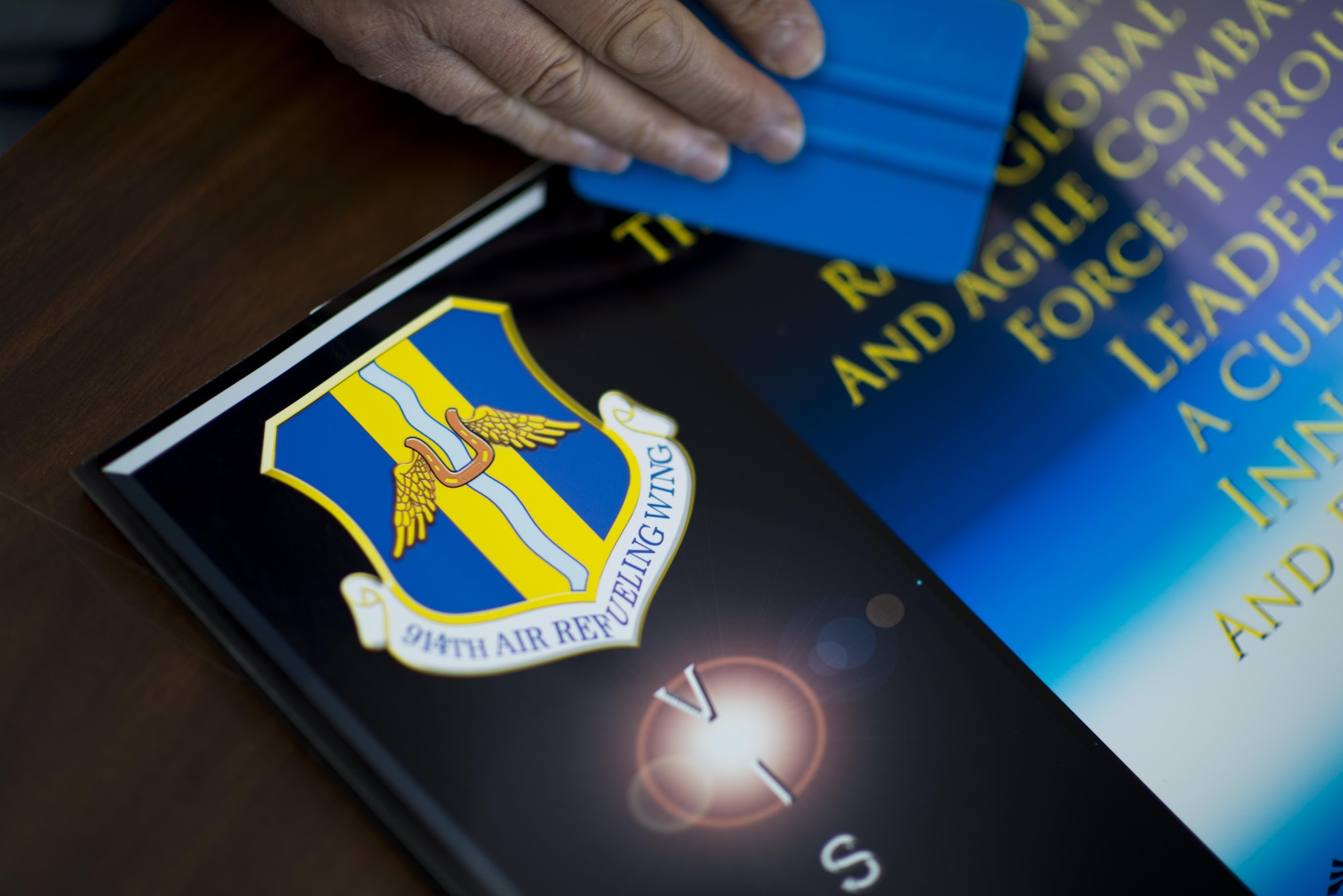 New visuals are produced for the recent change in mission for the 914th Air Refueling Wing, Niagara Falls Air Reserve Station, N.Y., June 28, 2017.  On June 3rd, the wing officially transitioned from an Airlift Wing, flying and maintaining the C-130 Hercules, to an Air Refueling Wing, flying the KC-135 Stratotanker.  (U.S. Air Force photo by Tech. Sgt. Stephanie Sawyer) 
