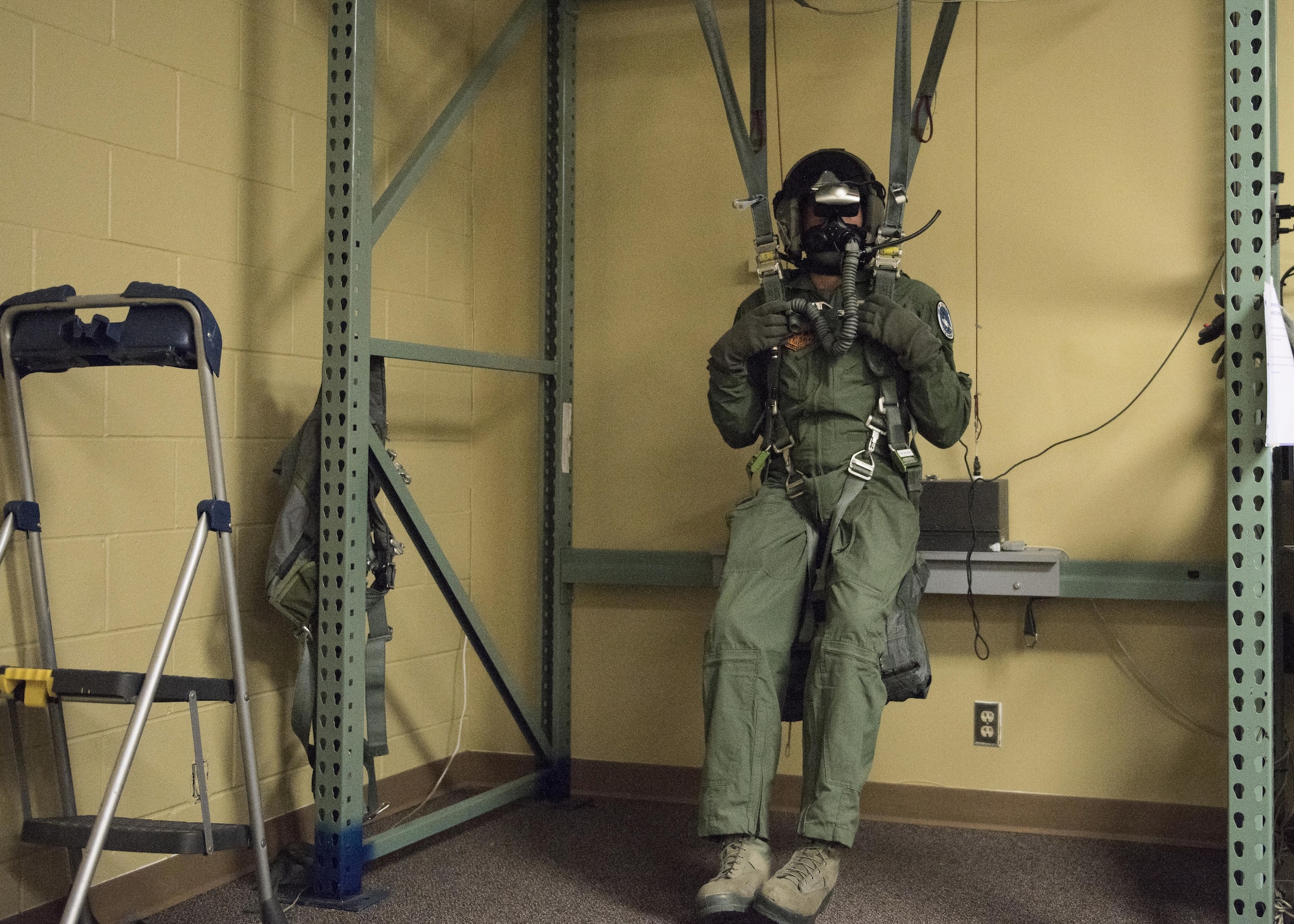 Vice Chairman Buster Gibson of the Shoshone-Paiute Tribes of the Duck Valley Indian Reservation gets parachute training, June 16, 2017, at Mountain Home Air Force Base, Idaho. The purpose of the training is to ensure in the event of an emergency he would be able to eject safely. (U.S. Air Force photo by Airman 1st Class Alaysia Berry/Released)