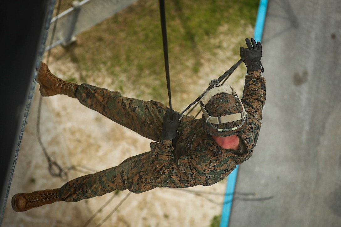 U.S. Marine Corps Cpl. Chad J. Dugan, from Ocala, Florida and a rifleman assigned to Alpha Company, 1st Battalion, 3rd Marine Regiment, rappels during Helicopter Rope Suspension Technique (HRST) and rappel training aboard Camp Hansen, Okinawa, Japan, June 20, 2017. The rappel tower prepares Marines to utilize these insertion techniques during for future operations. The Hawaii-based battalion is forward deployed to Okinawa, Japan as part of the Unit Deployment Program. (U.S. Marine Corps photo by Cpl. Aaron S. Patterson/Released)