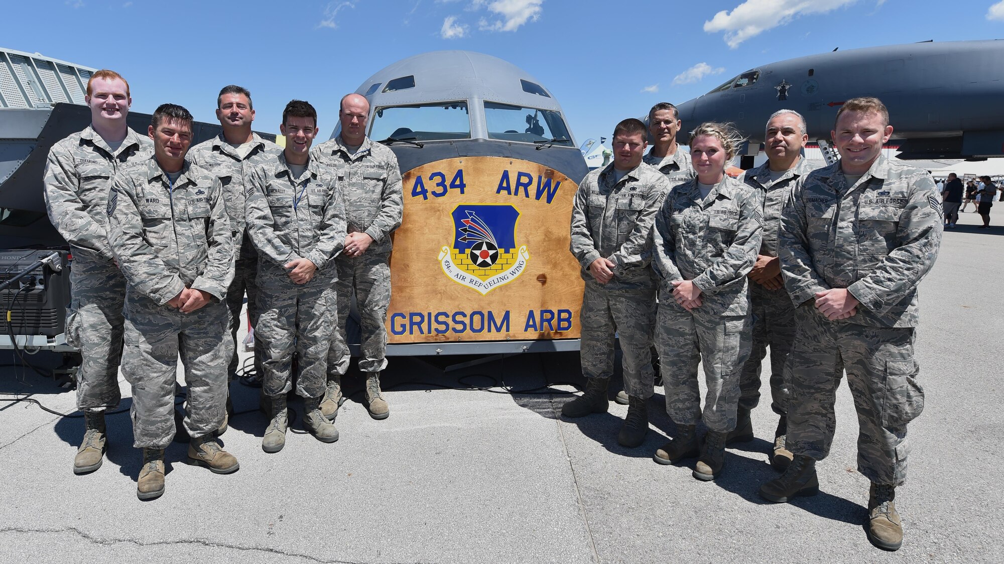 Twelve Grissom Airmen from the 434th Aircraft Maintenance Squadron volunteered at the 43rd Annual Vectren Dayton Airshow in Dayton, Ohio, operating an interactive flight deck and boom pod display June 24-25, 2017. From left to right are Staff Sgt. Keith Diamond, Master Sgt. Craig War, Senior Master Sgt. Aaron Wilson, Senior Airman Michael McNally, Master Sgt. Corey Fields, Tech. Sgt. Derek Nolley, Master Sgt. Kenneth Rowe, Staff Sgt. Kelsey St. Clair, Senior Master Sgt. Douglas Stogsdill, and Staff Sgt. Joshua Schumacher. (U.S. Air Force photo/Staff Sgt. Katrina Heikkinen)