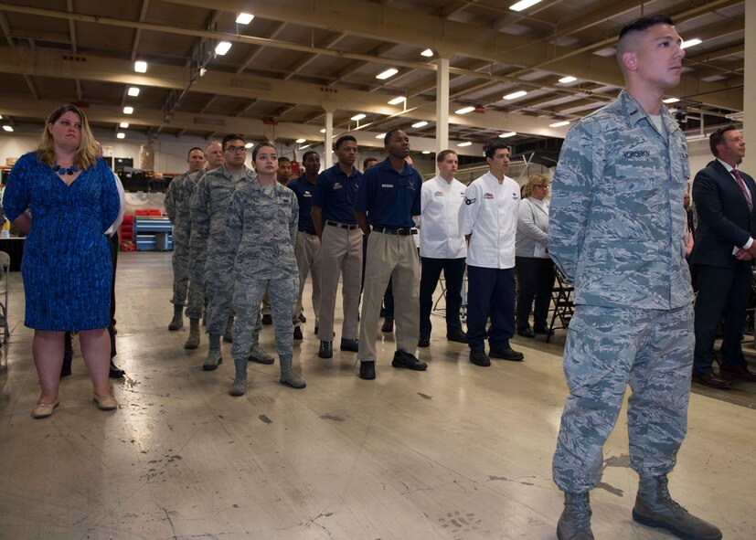 2nd Lt. Antony Vorobyov, 92nd Force Support Squadron Food Services officer, leads Airmen standing in formation as part of the FSS change of command ceremony June 27, 2017, at Fairchild Air Force Base, Washington. Squadron members formally offer a welcome salute to the incoming commander and a farewell salute to the outgoing commander.
(U.S. Air Force Photo / Airman 1st Class Ryan Lackey)