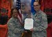 Col. Yvonne Spencer, 92nd Mission Support Group commander, bestows a Meritorious Service Medal to Lt. Col.Daniel Rigsbee, former 92nd Force Support Squadron commander, during the FSS change of command ceremony June 27, 2017, at Fairchild Air Force Base, Washington. Rigsbee has served the Air Force for 16 years.