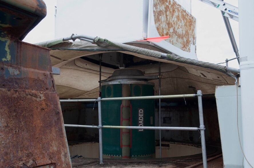 A missile is raised from a silo and into a transporter erector in the 90th Missile Wing missile complex, June 6, 2017. The missile was removed to comply with the New START Treaty agreement with Russia. The Air Force met their NST requirements when the 50th Minuteman III Intercontinental Ballistic Missile was removed from a silo in the 90th MW missile complex. (U.S. Air Force photo by Airman 1st Class Breanna Carter)