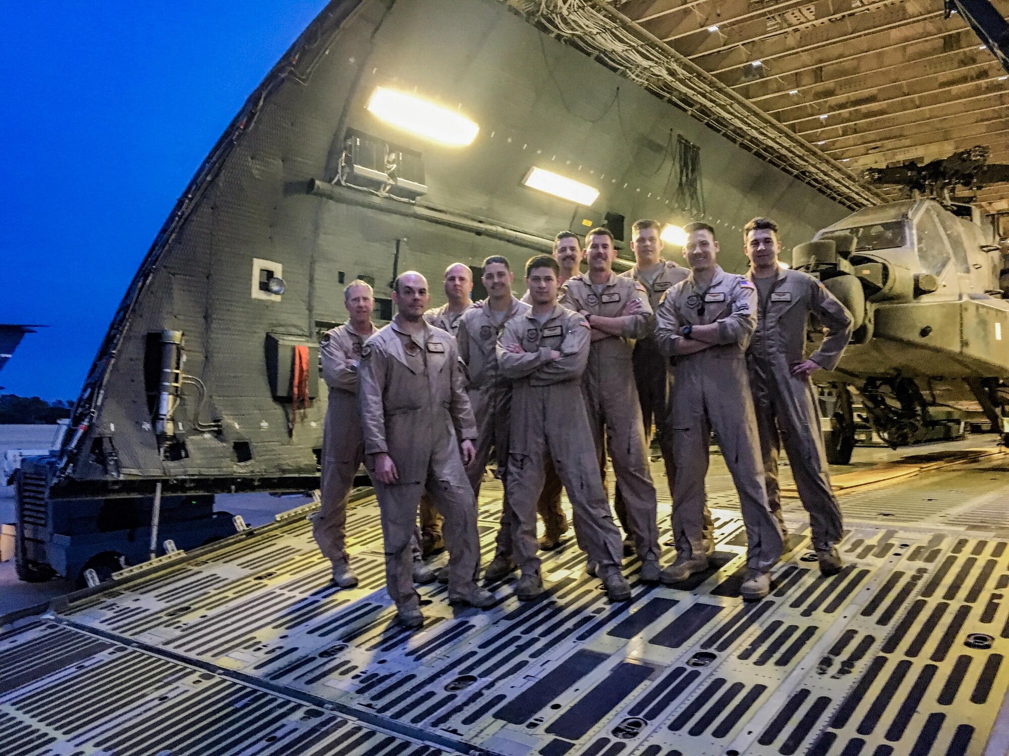 Personnel from the 22nd and 312th Airlift Squadrons at Travis Air Force Base, Calif., provide airlift and ground support during a joint U.S. TRANSCOM multimodal operation, March 21 to April 6, 2017. A multimodal stage transports cargo and personnel via multiple means in order to deliver them where they need to go in the most timely and efficient manner possible. (Courtesy photo)