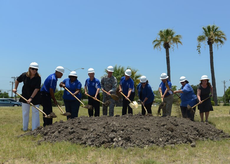 Members of the San Felipe Del Rio Consolidated Independent School District and local civic leaders join U.S. Air Force Col. Thomas Shank in breaking the ground for the future Science, Technology, Mathematics and Engineering Magnet Elementary School at Laughlin Air Force Base,Tx., June 23, 2017. Building this school base will allow students to have direct access to mentors that work in the STEM career field.