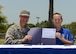 San Felipe Del Rio Consolidated Independent School District Board of Trustees’ President Mr. Joshua Overfelt and U.S. Air Force Col. Thomas Shank pose after a symbolic signing for this project at Laughlin Air Force Base, Tx., June 27, 2017. Through collaborative efforts, the base and city have shared both resources and expenses to facilitate the school’s construction.