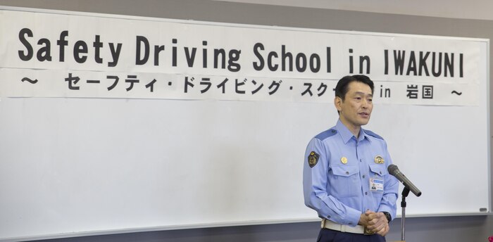 Katsuyoshi Abe, chief of Iwakuni City Police Department, introduces himself during the opening ceremony of a free driving class held for Marine Corps Air Station Iwakuni residents in Iwakuni city, Japan, June 28, 2017. Twenty station residents were invited to take part in the short educational workshop aimed to decrease the number of traffic accidents and violations caused by station residents. (U.S. Marine Corps photo by Lance Cpl. Carlos Jimenez)